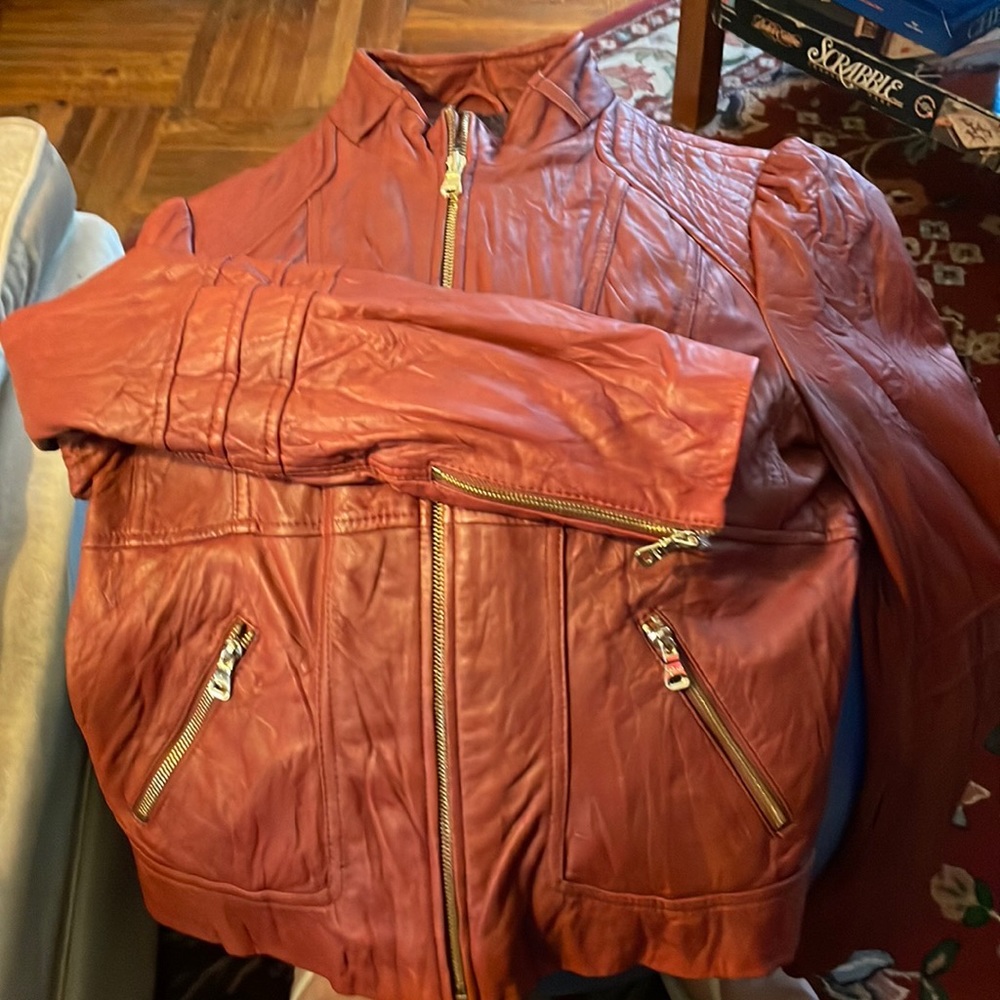 Guess brand, genuine leather, brick red, racing/moto style jacket.